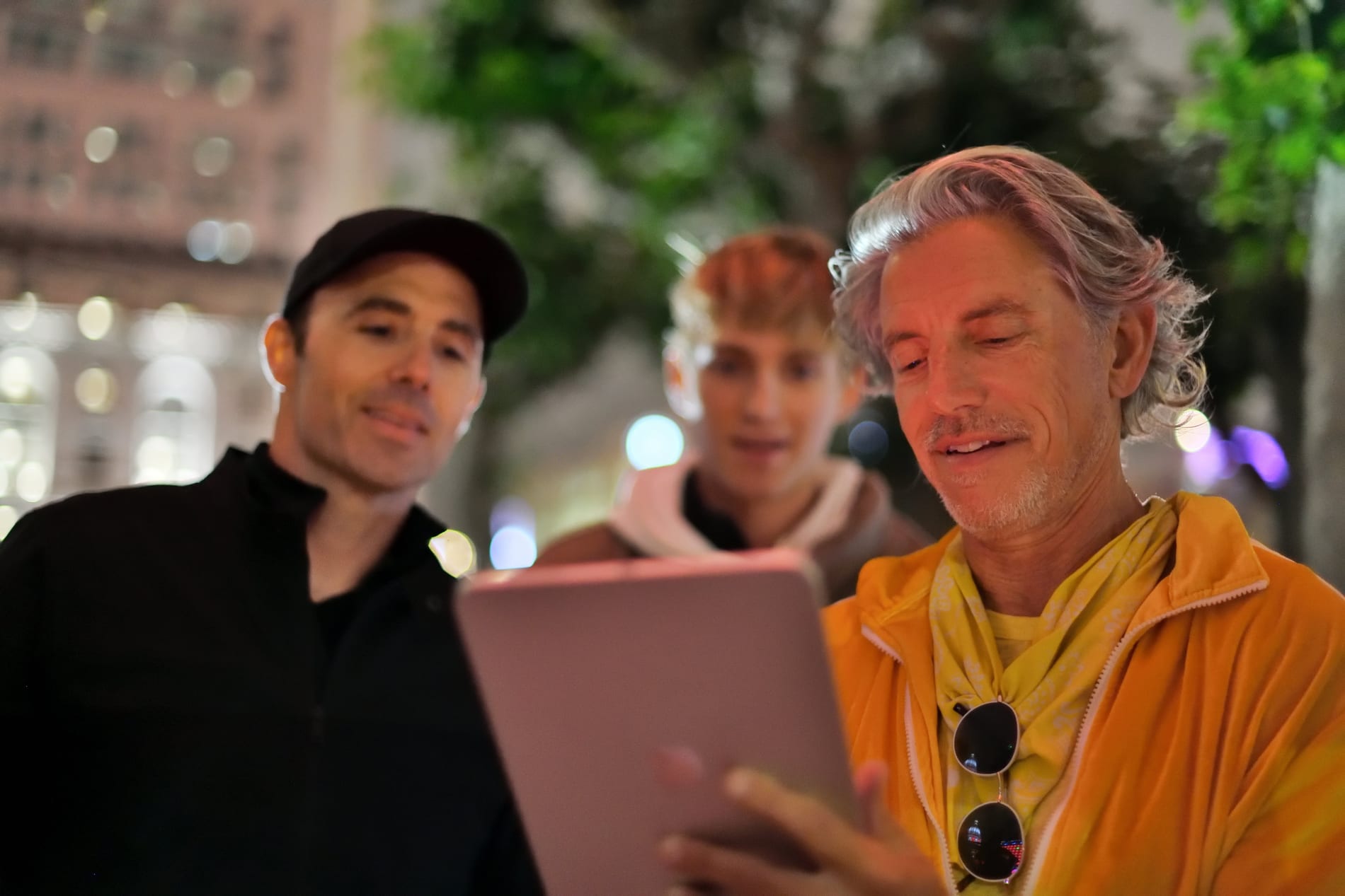 The team testing software on a laptop